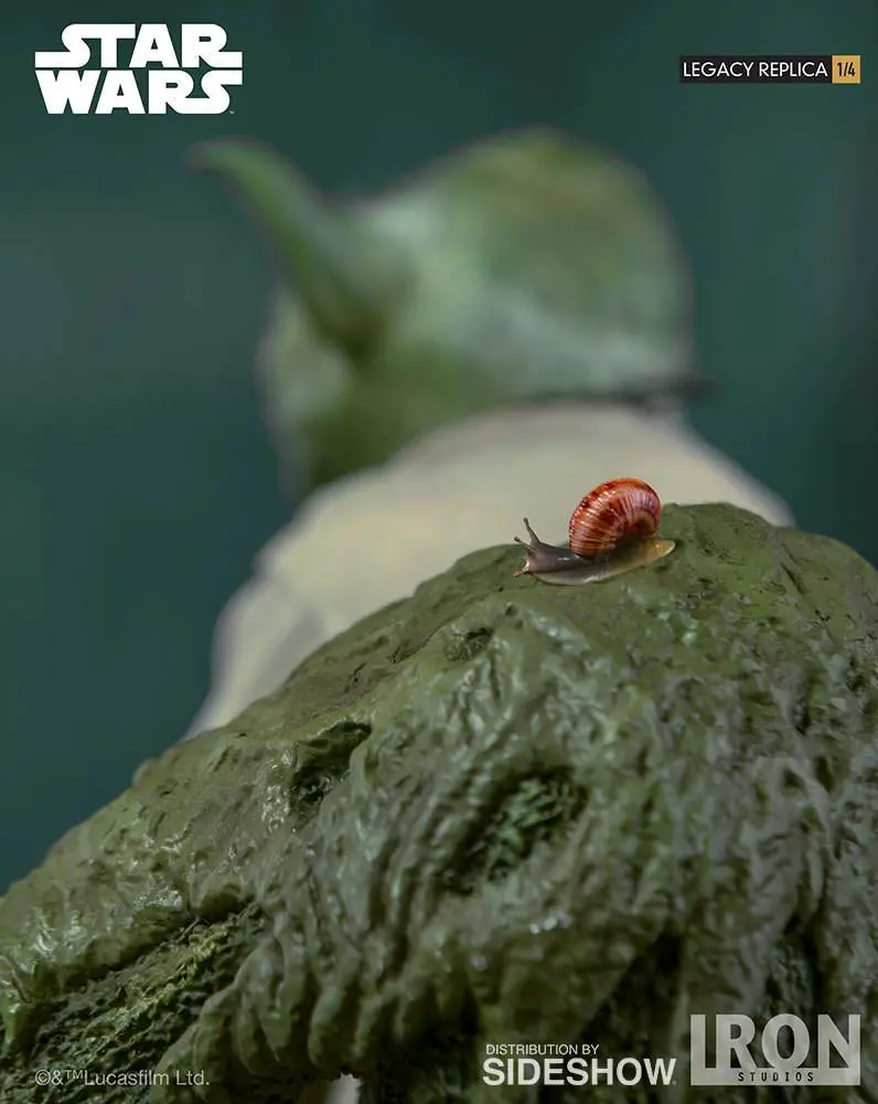 Close-up of Yoda's back with snail