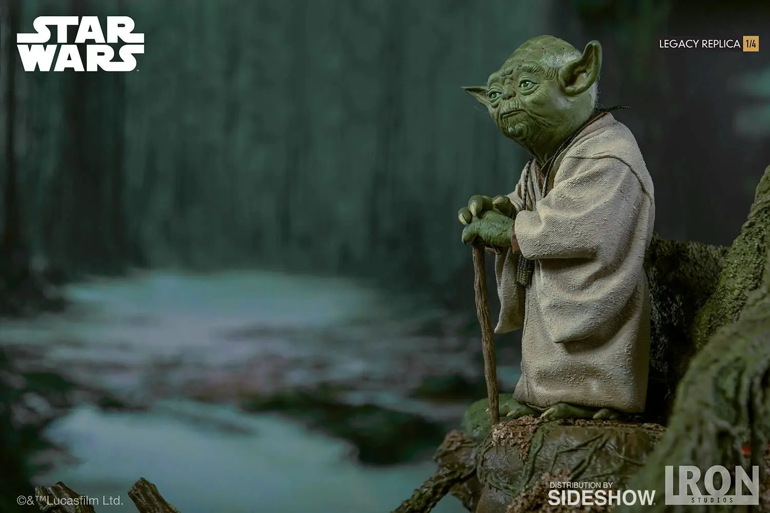 Yoda statue holding walking stick