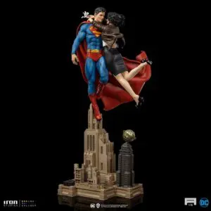 Iconic superhero lifting woman statue display