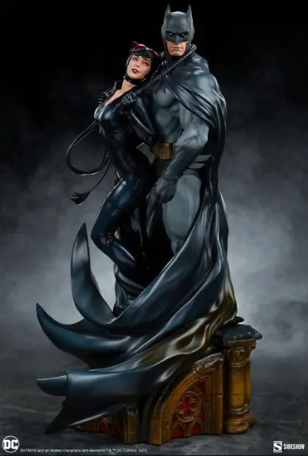 Batman and Catwoman in dramatic stance