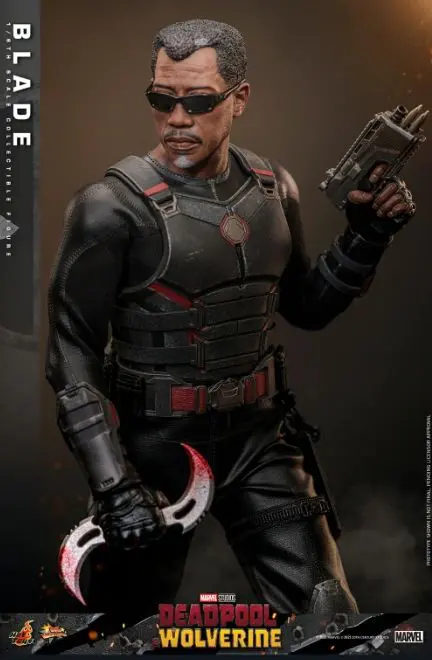 Blade action figure holding weapons