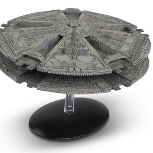 Gray circular sci-fi spaceship model on stand
