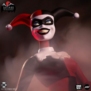 Harley Quinn smiling in dramatic lighting