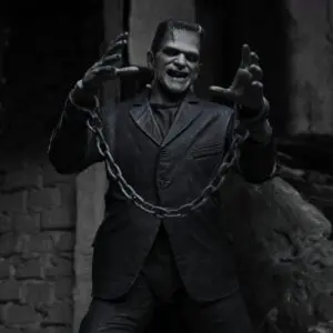 Monster figure with chains in dark setting.