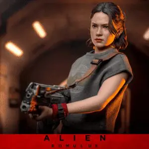 "Action figure of a female character with weapon."